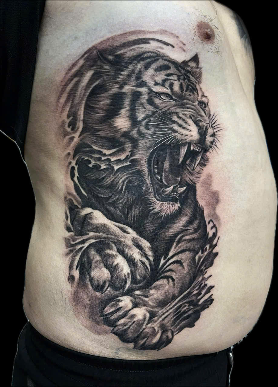 Tattoo in front of stomach